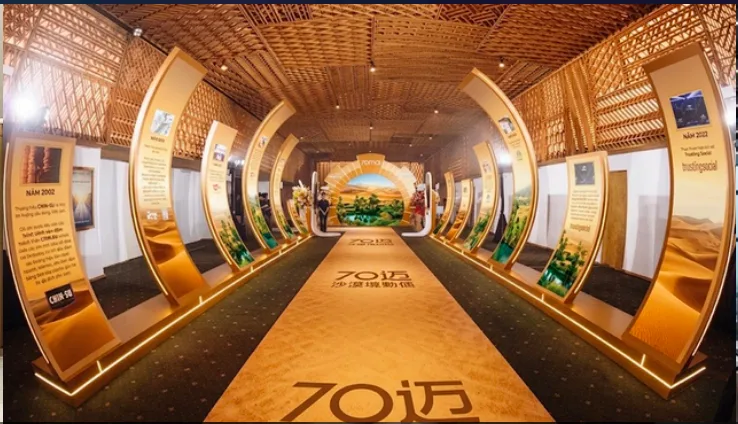 Immersive timeline corridor with illuminated display panels guiding visitors through brand history
